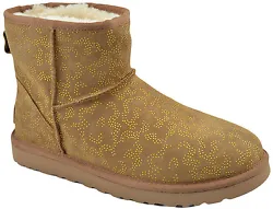 Outsole: Lightweight and flexible molded EVA with patent protected outsole tread design. UGG Trademark logo on the...