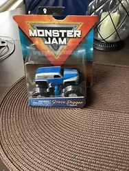 Monster Jam Truck GRAVE DIGGER THE LEGEND 1:64 Retro Rebels 2019 Driver Man. Unopened but package shows shelf storage...