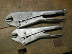 Here is a nice pair of old vise grip type locking pliers marked Craftsman Made In USA #9-45342 and #9-45341 in good...