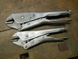 Here is a nice pair of old vise grip type locking pliers marked Craftsman Made In USA #9-45342 and #9-45341 in good...