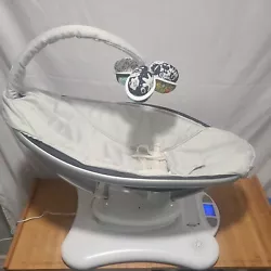 4moms mamaroo baby swing. The forth picture shows a small stain on it did not try to get it out and the toy bar where...