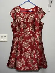 ￼ Women’s Beautiful Qipao Asian style dress. It is red with metallic roses. Women’s Size 14. New with tags. It is...