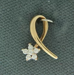 10K gold w/ CZ stones. 12.4 mm wide.