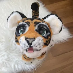 FurReal interactive tiger in good condition. Smoke free home. Needs batteries. Two untreated orange marks near nose and...