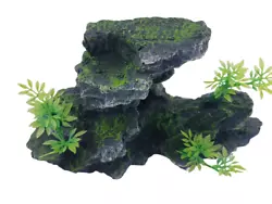 Unusual Rock Outcrop with added plants. Attractive looking boulder with artificial plastic plants, will bring color to...