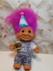 The troll is new, in the original wrapper, and has a Russ sticker on the bottom of one foot. The troll has never had a...
