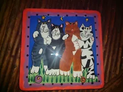 Ceramic trivet tile from artist Candice Reiter, known for her clever cat designs. Measures 8 x8 x1. One small chip as...