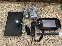 Nintendo Wii U 32GB Console Deluxe Set - Black. Used fully functional Wii U Deluxe. A few scratches on casing but was...