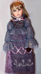 She is a beautiful, collectible reproduction doll designed by Christine Cecile. Her stand are included. Doll are in new...