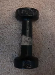 Has visible wear and chips to the paint. Also has tape still stuck to the handle. Is 1, single 2 lb dumbbell.