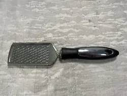 This is aLarge Handle Flat Cheese Grater 10