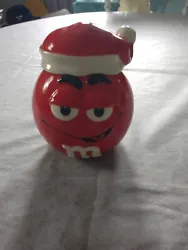 Look no further than this ceramic candy and cookie jar featuring the beloved Red M&M character dressed as Santa Claus....