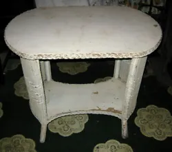 IT IS QUITE NOSTALGIC LOOKING AND HAS AGE APPROPRIATE WEAR AS SHOWN. IT HAD A GLASS TOP WITH FANCY LINEN UNDER THE...