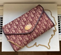 Gold chain strap can be pull inside to wear the purse as hand clutch. Therefore you can see whitish peeling across the...
