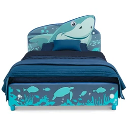 This Shark Upholstered Twin Bed by Delta Children allows kids to swim (or sleep) with the sharks. No box spring...