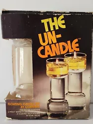 3 Floating Wick Holders. Original Instruction Booklet. Original Un-Candle Box.