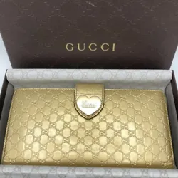 This authentic Gucci long wallet is a beautiful piece from the Italian fashion house.