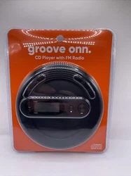 Enjoy your favorite music on the go with the ONN 100008711 Personal CD Player with FM Radio. This sleek black device...