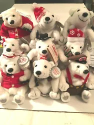 Each bear is holding a bottle of Coca Cola soda. All bears are in a sitting position.