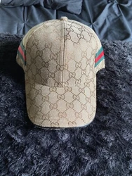 Brown Gucci Hat.