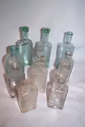 Up for auction is a great lot of antique Taunton Mass medicine bottles to include a S.O. Dunbar-A.L. Willard Druggist,...
