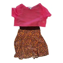 My daughter wore this when she was a 10 YO for reference. Small cut in skirt - see photo.