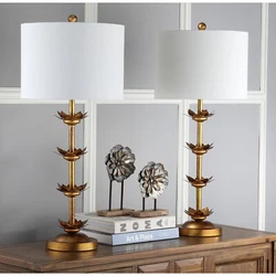 Designed for the gracious living room, finely sculpted leaves adorn this leaf table lamp from top to bottom. Inspired...