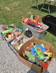 This Nerf toy lot includes over 20 guns, ammo, and accessories for hours of outdoor fun. All items have been gently...