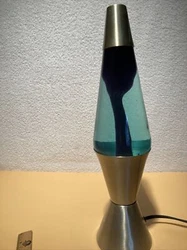 The item is in great working condition and includes a Starlight base. This lava lamp is a nice shape. There’s slight...