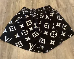 Super cute high waisted shorts that are a size large. The waistband is half elastic.