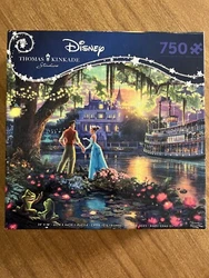 Disney Thomas Kinkade The Princess and The Frog 750 pc Puzzle. Recently completed, all pieces included. Comes with a...