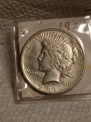 This is a beautiful Peace Silver Dollar from the United States Mint in Philadelphia. The coin is made of .900 fine...