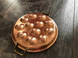This vintage copper pan is truly a treasure for any collector or cooking enthusiast. With 12 wells, it is perfect for...