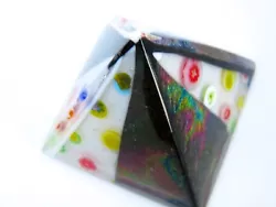 This is a handmade fused glass pyramid signed by Janet Sholder.  The base measures  2 5/8