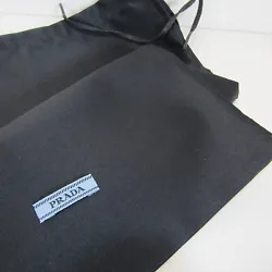 Elegant black satin dust bag by PRADA. Has black woven drawstring closure. Logo label near bottom of bag.