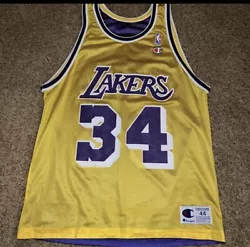 Los Angeles Lakers Shaq O’Neal Reversible Champion Jersey. In Great Condition. Light Wear on One Of The Numbers....