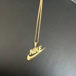Unisex Stainless Steel Nike Logo Swoosh Necklace. Includes both pendant and necklace.Chain length is 20 inches.Jewelry...