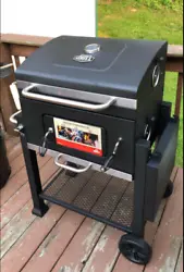 Charcoal grill with black powder coated finish. Adjust charcoal pan height with crank to customize cooking...