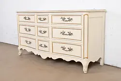 By Kindel Furniture. A gorgeous French Provincial Louis XV style nine-drawer dresser or chest of drawers. USA, Circa...
