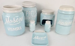 1 - Utensil Jar. 1 - Sponge Jar. Spoon Rest. Good pre-owned condition. Has a few small unglazed spots. The lid does not...