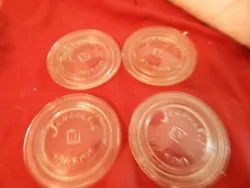4 glass lid inserts in top condition.