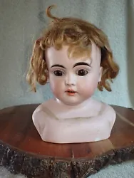 This is a lovely antique German Kestner M alphabet series bisque doll head. The head turns to the right. Her brown...