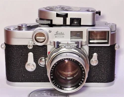 EX+ LEICA M3 Single Stroke Outfit w/ SUMMICRON f/2 50mm Near Focusing Range. A LEICA M3 with Summicron f/2 50mm lens....