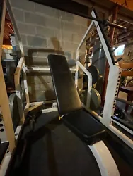 Cybex Squat Rack, Adjustable bench. A Squat Rack is a free weight rack that can be used in lieu of a spotter to safely...