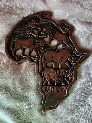 Africa Continent wood carving wall decor. Was purchased from a craft fair a few years ago as a gift.  Never been hung...