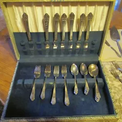 They are stamped ROGERS DELUXE PLATE; ORIGINAL ROGERS; Precious 1- Sugar spoon;. 1-Serving set, Spoon and Fork;....