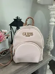 NWOT!!! stunning GUESS backpack in beautiful pink and rose gold color theme. The exterior is made of high-quality faux...