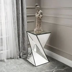 A bold and modern piece, this side table is the definition of eye-catching. Its many mirrored surfaces can reflect all...