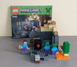 Lego Minecraft Réf 21119 - The Dungeon. Livré avec la Notice dorigine. Il manque juste 1 outil (pioche gris argenté...