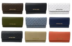Trifold wallet with snap button closure. Signature colors material: PVC =. Solid colors material: Saffiano Leather. 1...